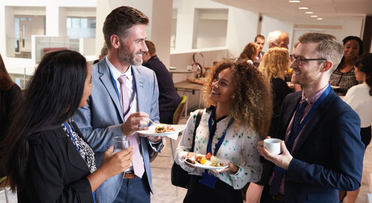 Image showing business professional talking over lunch